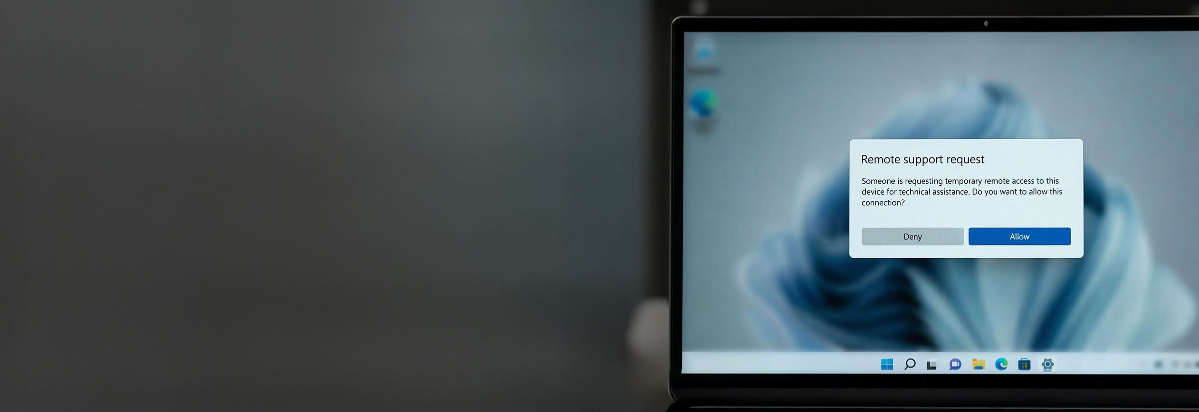 A remote support request pop-up is one of the possible AnyDesk scams you could encounter.