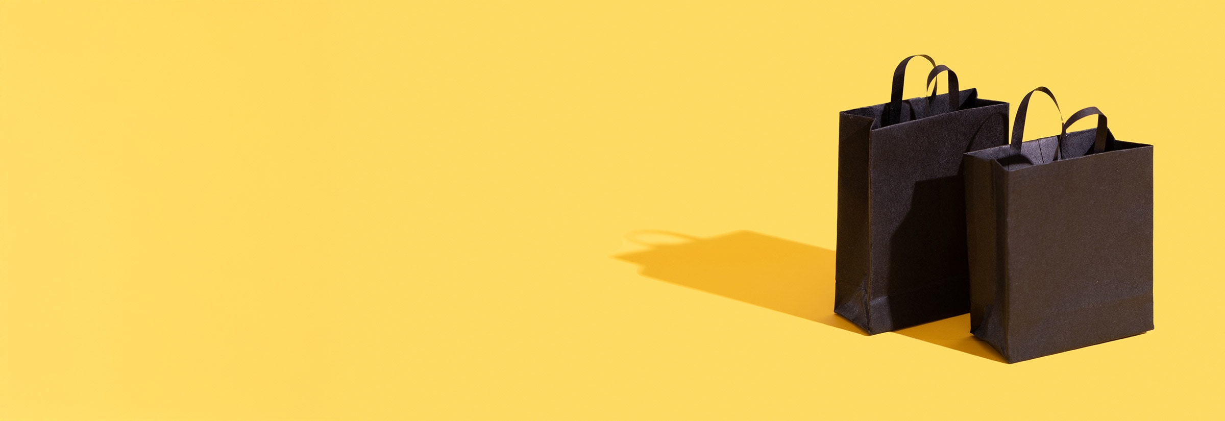 Shopping bags representing Black Friday deals.