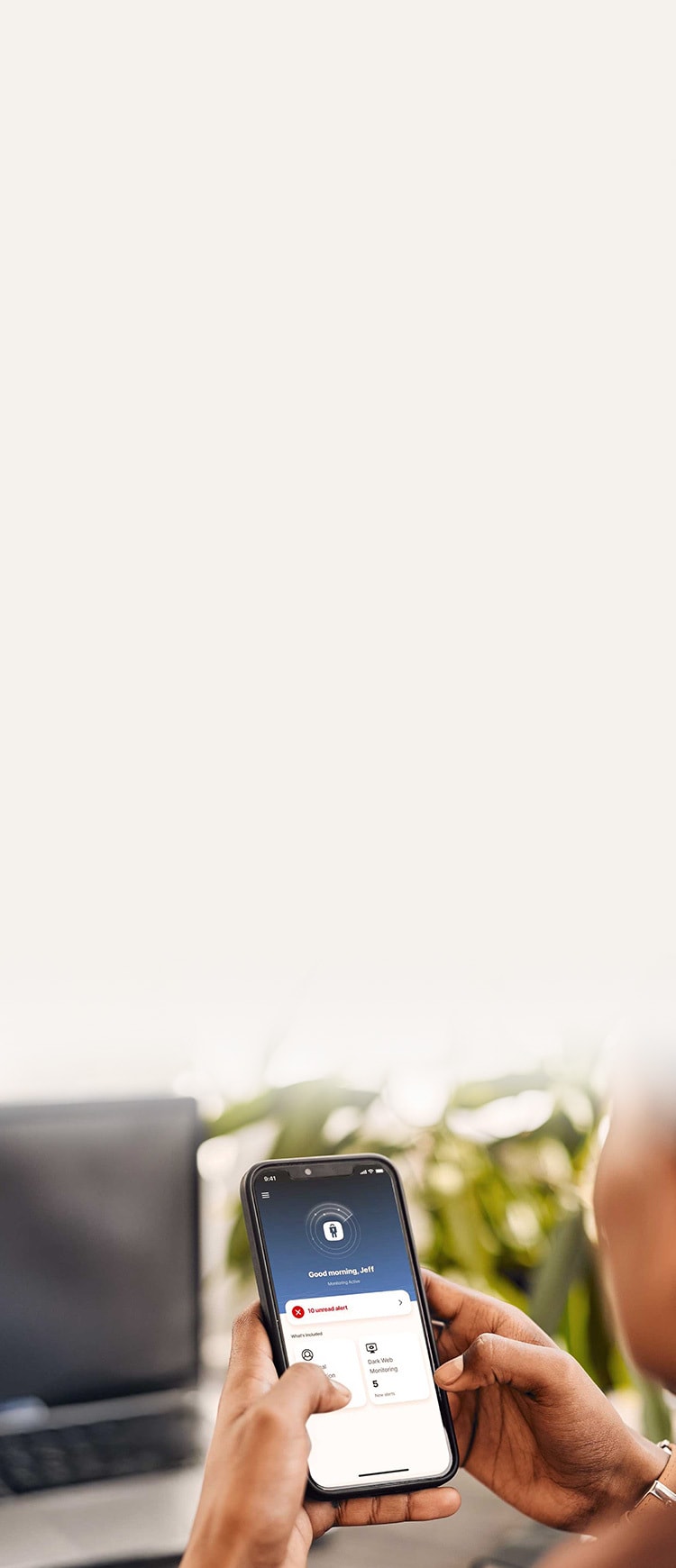 Person viewing LifeLock on their cellphone.