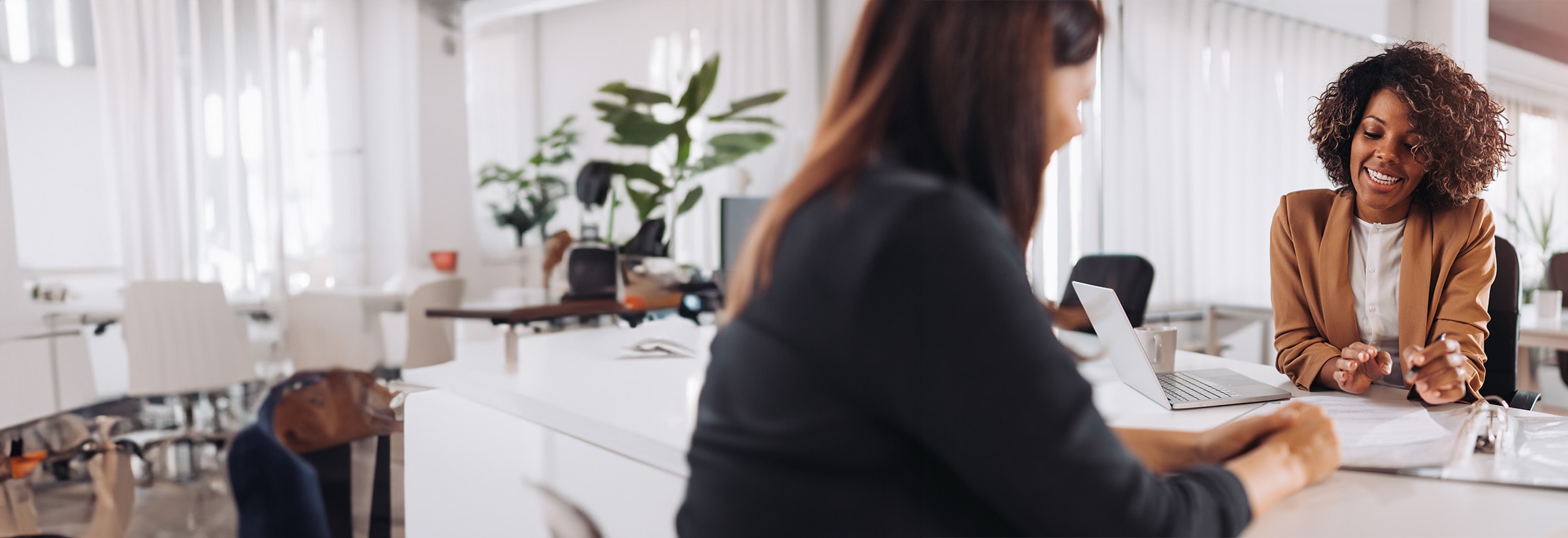 LifeLock Identity Restoration Specialists seen answering a call from a customer.