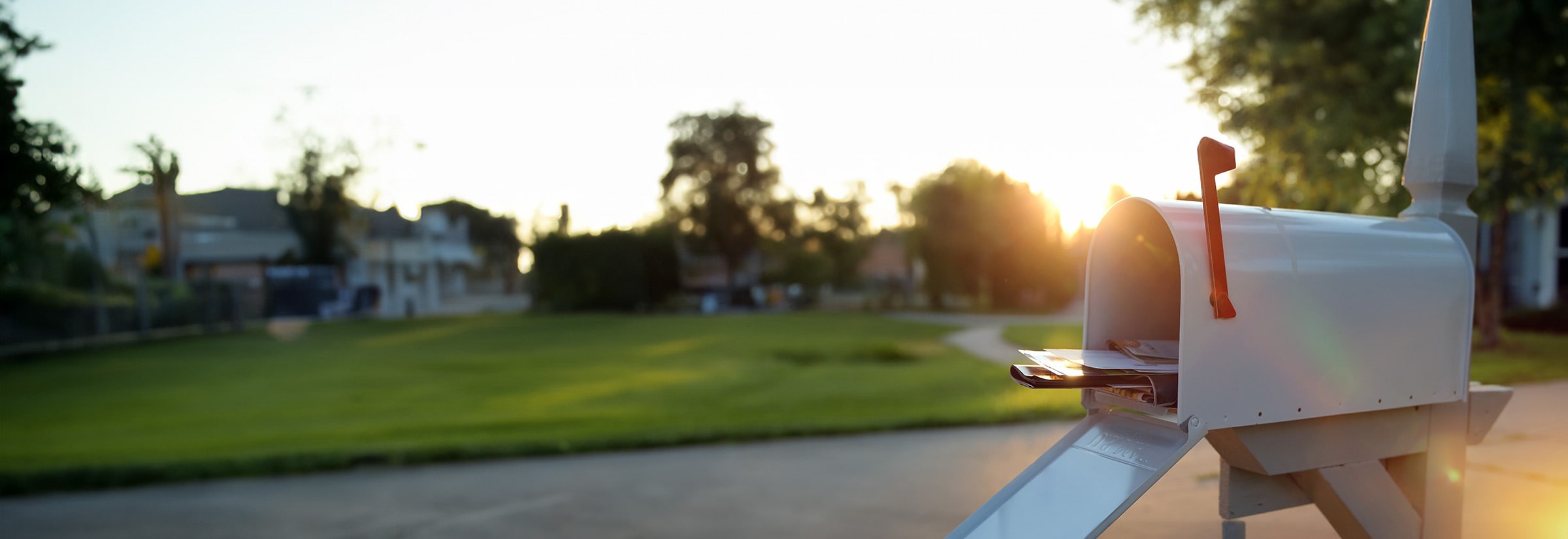 A person’s mailbox is open, which could signal mail theft.