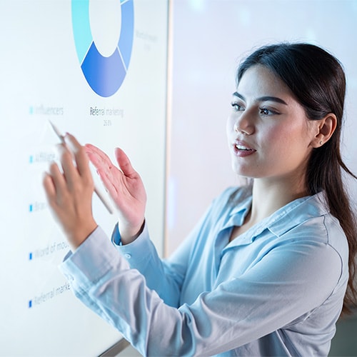 Woman looking at papers learning about how common identity theft is.