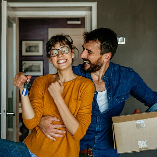  A couple tours homes after learning how to buy a house with bad credit.