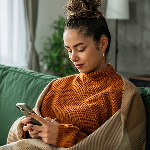 An image of a woman receiving a potential spam call.